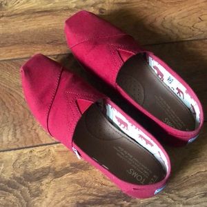 Red Toms slip on canvas shoes